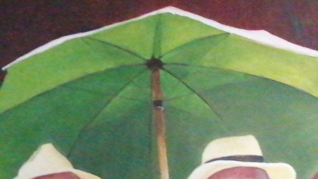 paraguas verde que forma parte de un cuadro